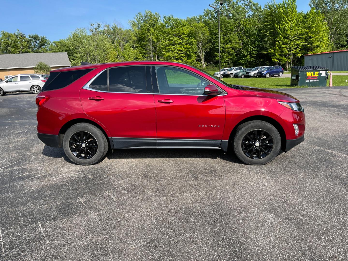 2018 Red /Black Chevrolet Equinox LT AWD (2GNAXSEV2J6) with an 1.5L I4 DOHC 16V TURBO engine, 6-Speed Automatic transmission, located at 11115 Chardon Rd. , Chardon, OH, 44024, (440) 214-9705, 41.580246, -81.241943 - This 2018 Chevrolet Equinox LT AWD with a 1.5L EcoTec Turbocharged engine and 6-speed automatic transmission offers a balanced blend of performance and fuel efficiency with a 30 MPG highway rating. This compact SUV is well-equipped for safety and convenience, featuring blind spot monitoring, rear cr - Photo#5